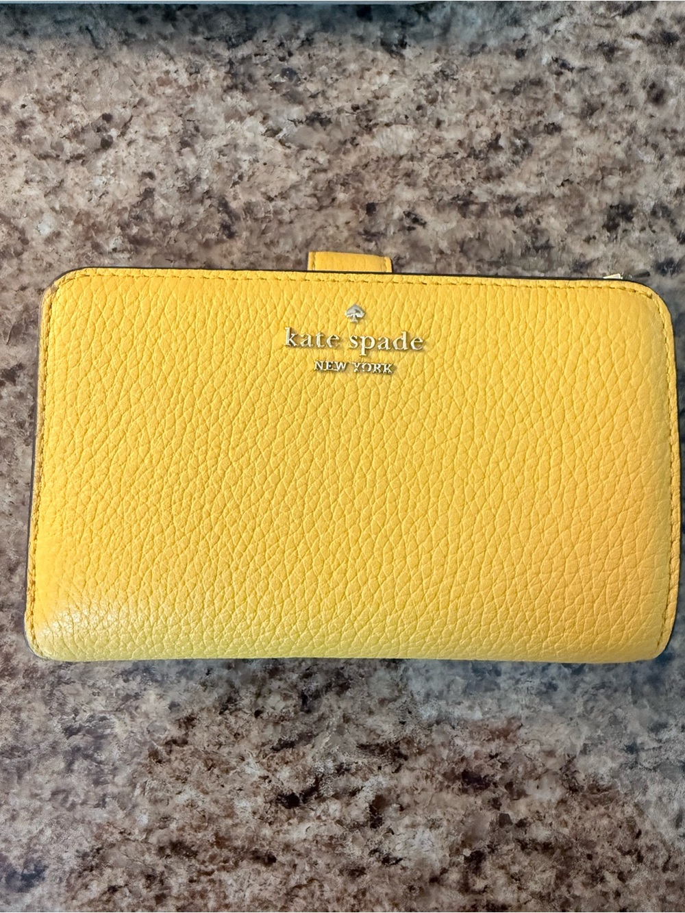 kate spade Yellow Pebbled Leather Wallet with Silver Logo